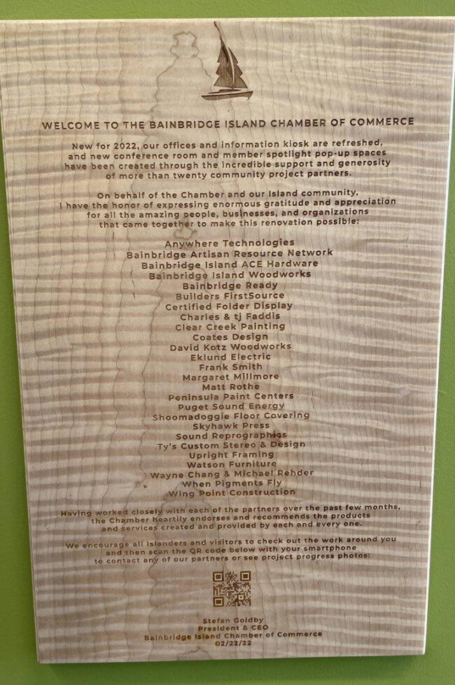 Commemorative plaque celebrating the 25+ community partners that came together to help renovate the Bainbridge Chamber offices and Information Kiosk